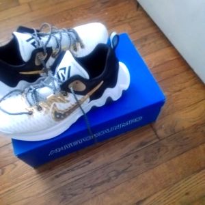 Gianni's immortality gold black and white athletic shoes Greek freak size 13